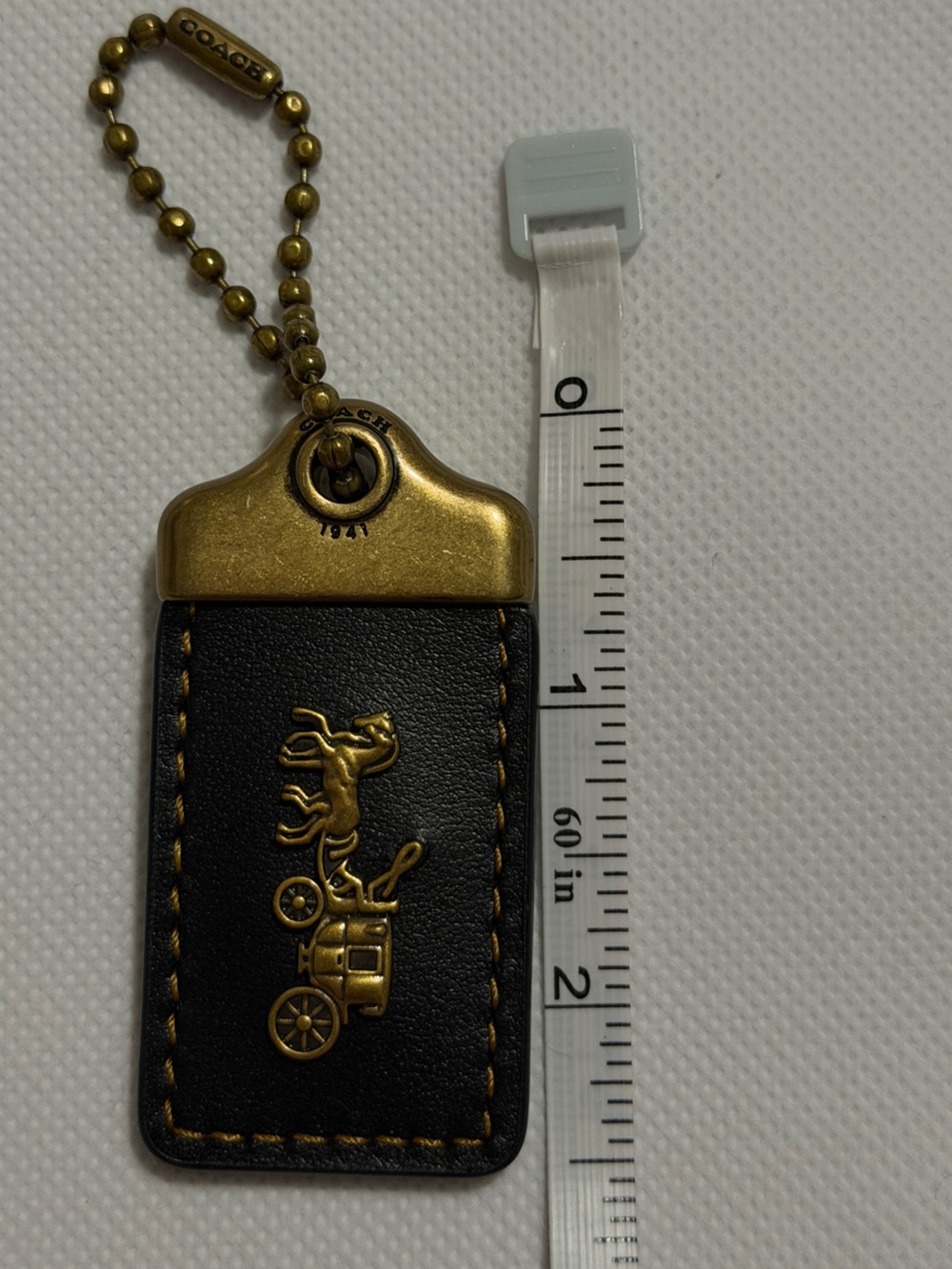 Coach 1941 Horse Carriage Hang Tag Bag Charm.